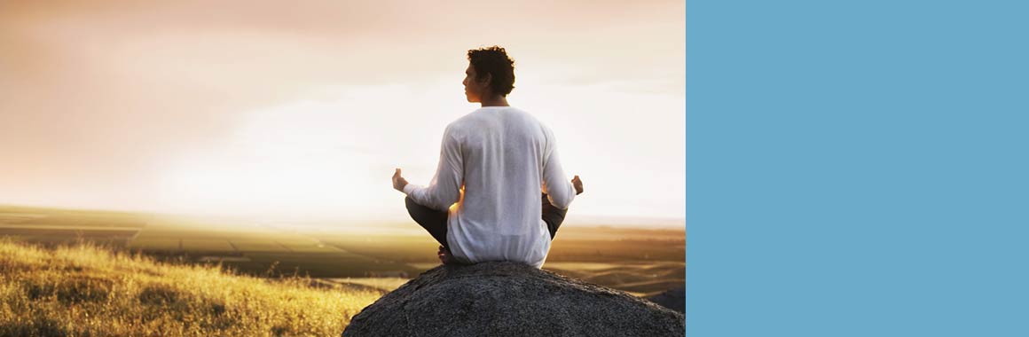Man-sitting-meditation-in-nature