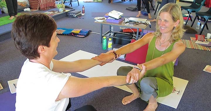 Dru Kids and Teens yoga course teacher Suzanna Thell with student